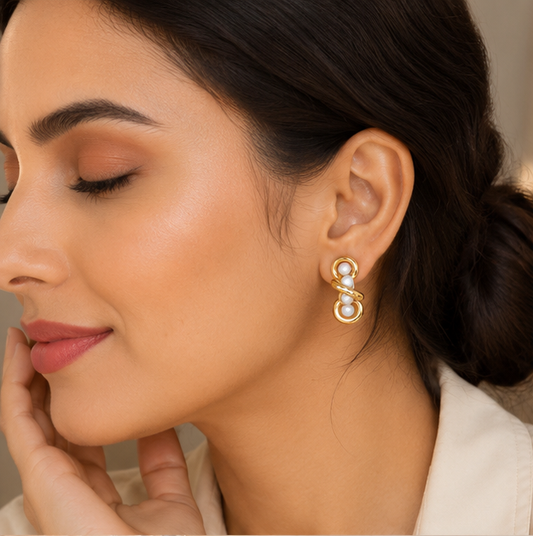 Elegant Gold Interlock Pearl Stud Earrings