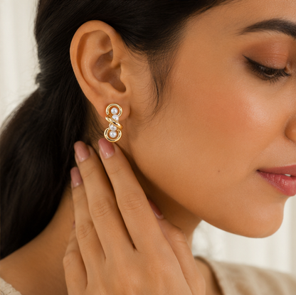 Elegant Gold Interlock Pearl Stud Earrings