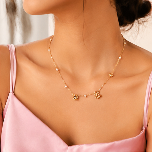 Elegant Gold Charm Pearl Necklace