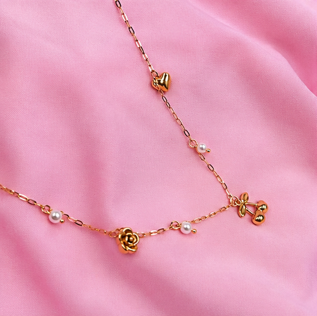 Elegant Gold Charm Pearl Necklace