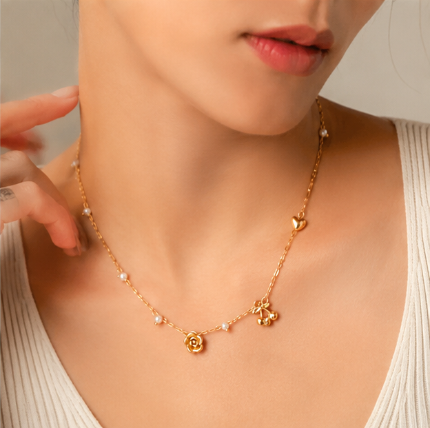 Elegant Gold Charm Pearl Necklace